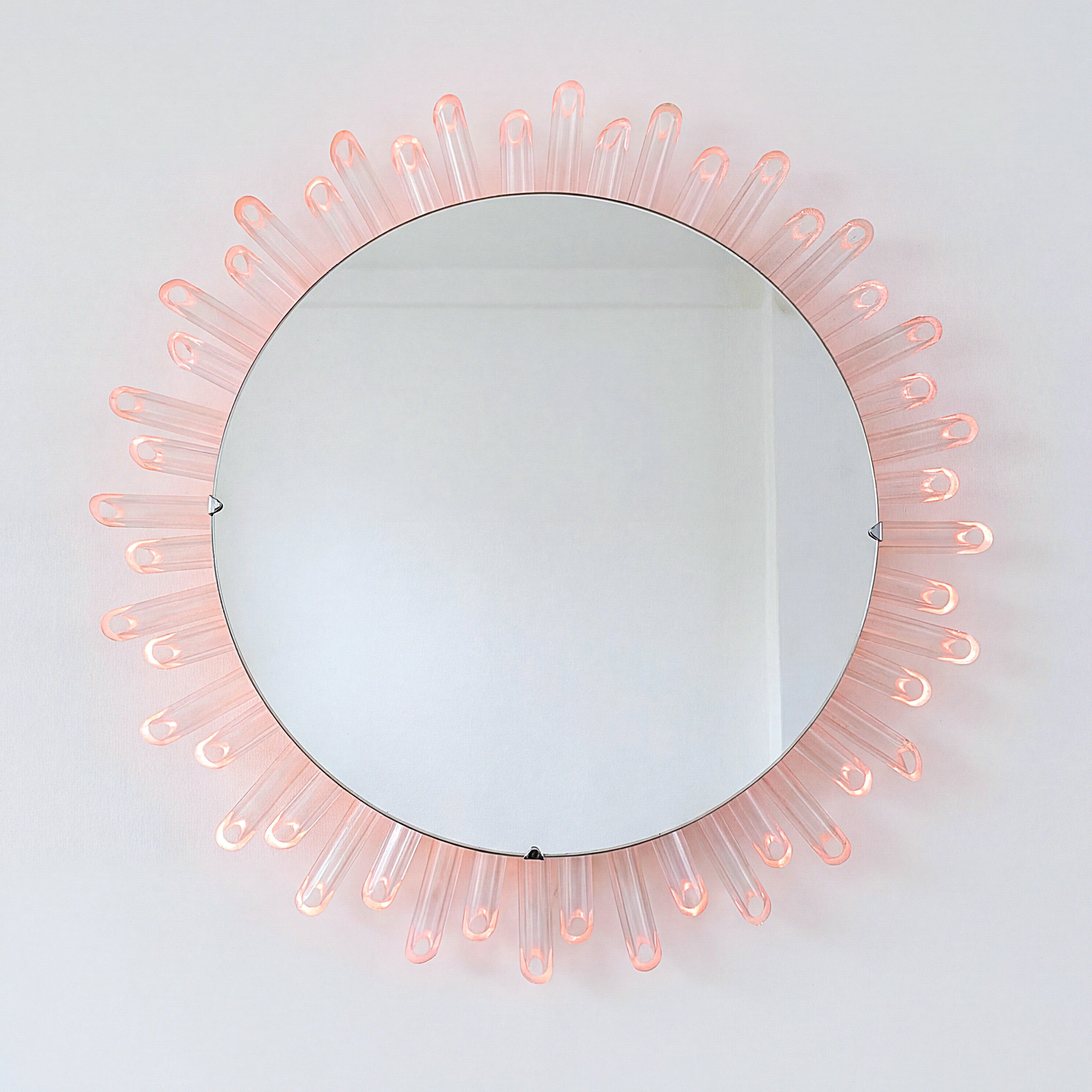 Mid-Century_Modern_Sunburst_Mirror_Wall_Lamp_in_Lucite_with_Pink_Glow,_1970s