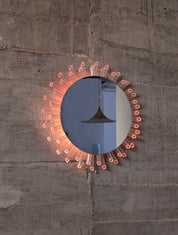 Mid-Century_Modern_Sunburst_Mirror_Wall_Lamp_in_Lucite_with_Pink_Glow,_1970s