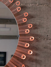 Mid-Century_Modern_Sunburst_Mirror_Wall_Lamp_in_Lucite_with_Pink_Glow,_1970s