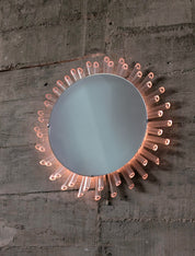 Mid-Century_Modern_Sunburst_Mirror_Wall_Lamp_in_Lucite_with_Pink_Glow,_1970s