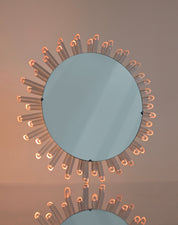 Mid-Century_Modern_Sunburst_Mirror_Wall_Lamp_in_Lucite_with_Pink_Glow,_1970s