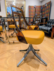 Set_of_4_Grafton_Atomic_Swivel_Chairs_in_Amber_Lucite_and_Mustard_Leather