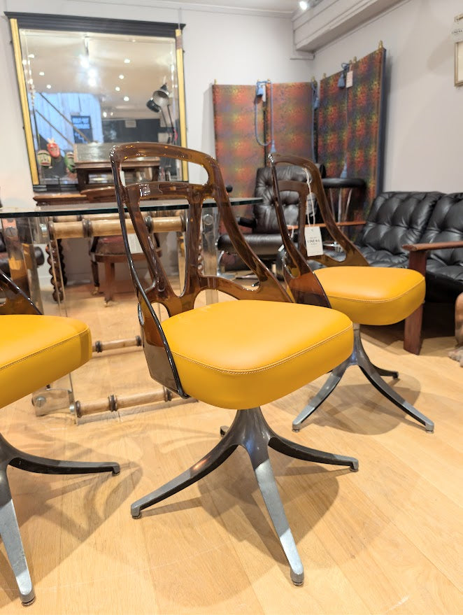 Set_of_4_Grafton_Atomic_Swivel_Chairs_in_Amber_Lucite_and_Mustard_Leather