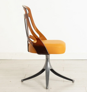 Set_of_4_Grafton_Atomic_Swivel_Chairs_in_Amber_Lucite_and_Mustard_Leather