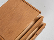 Midcentury_bench_and_container_in_oak_by_Aksel_Kjersgaard_1960s