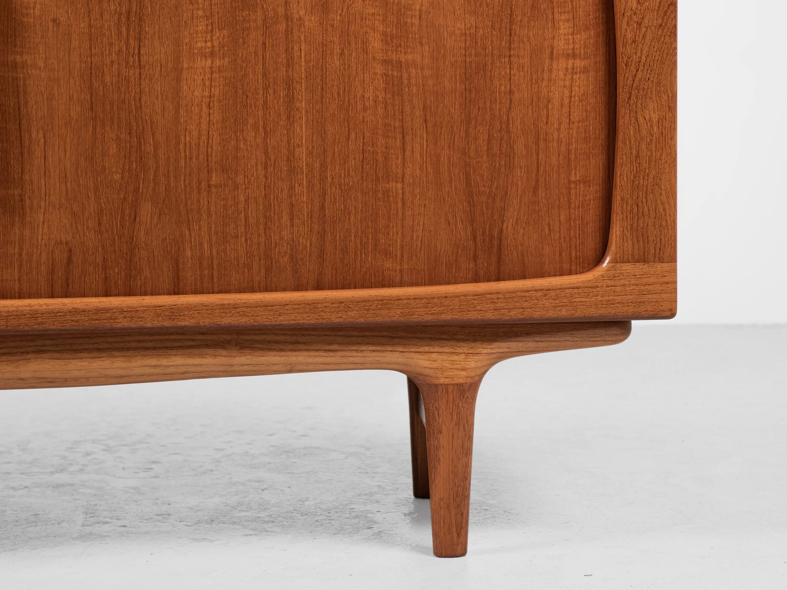 Midcentury_compact_sideboard_with_tambour_doors_in_teak_by_Johannes_Andersen_for_Silkeborg_1960s