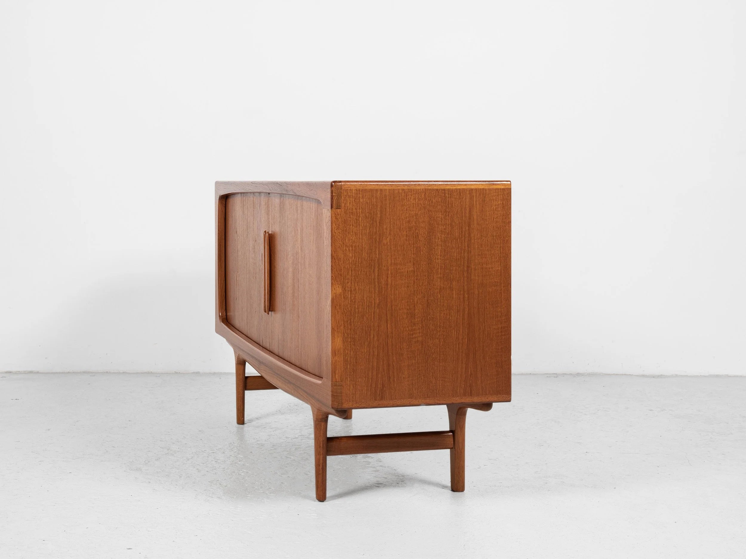 Midcentury_compact_sideboard_with_tambour_doors_in_teak_by_Johannes_Andersen_for_Silkeborg_1960s