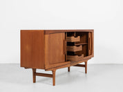Midcentury_compact_sideboard_with_tambour_doors_in_teak_by_Johannes_Andersen_for_Silkeborg_1960s