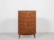 Midcentury_Danish_chest_in_teak_1960s,_bowed_front_with_half_moon_drawer_handles