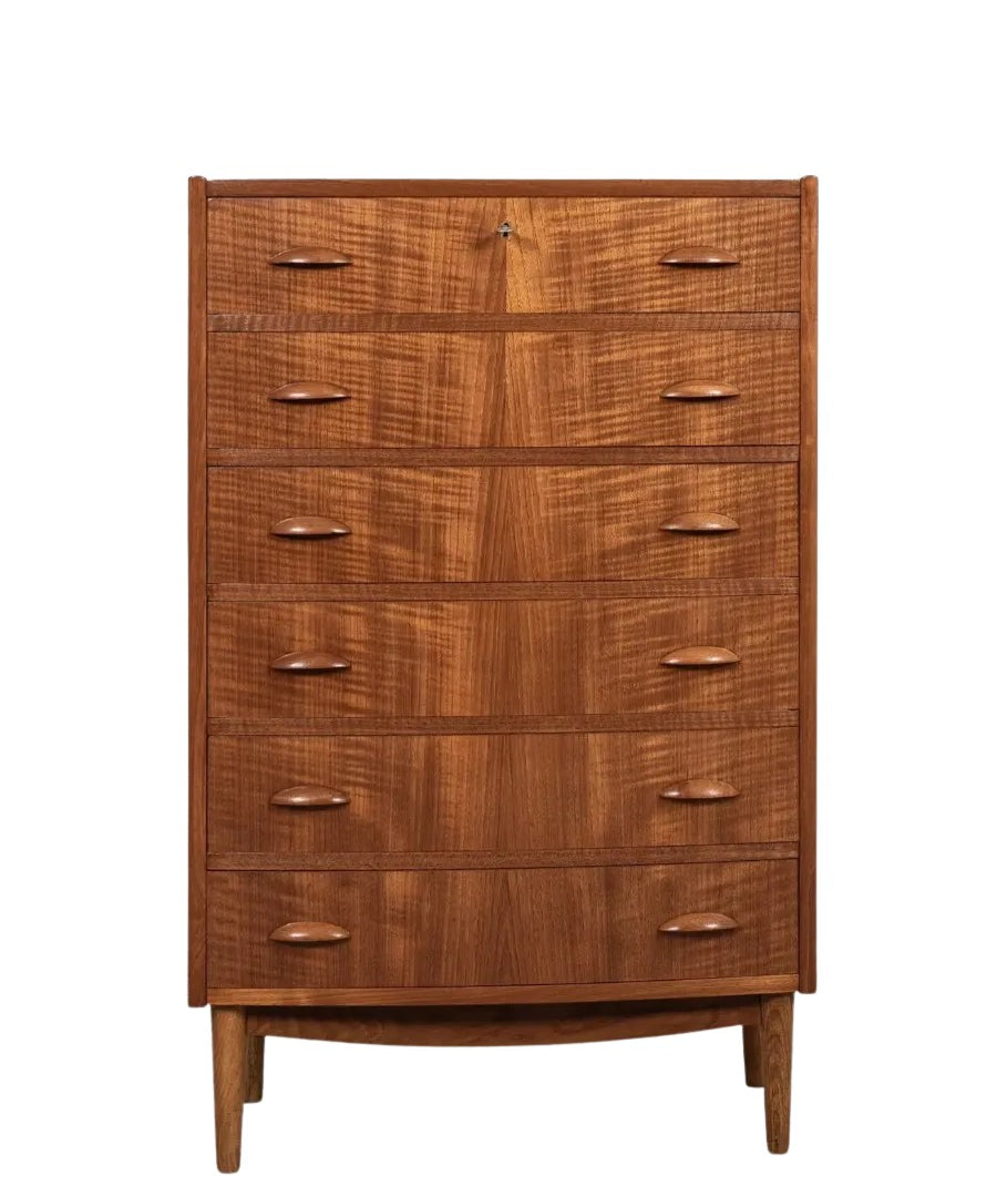 Midcentury_Danish_chest_in_teak_1960s,_bowed_front_with_half_moon_drawer_handles