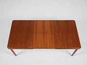 Midcentury_extendable_dining_table_in_teak_1960s_with_rounded_corners_and_butterfly_extension