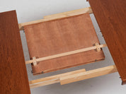 Midcentury_extendable_dining_table_in_teak_1960s_with_rounded_corners_and_butterfly_extension