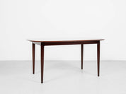 Midcentury_oval_dining_table_in_rosewood_1960s_with_2_extensions