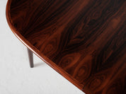 Midcentury_oval_dining_table_in_rosewood_1960s_with_2_extensions