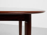 Midcentury_oval_dining_table_in_rosewood_1960s_with_2_extensions