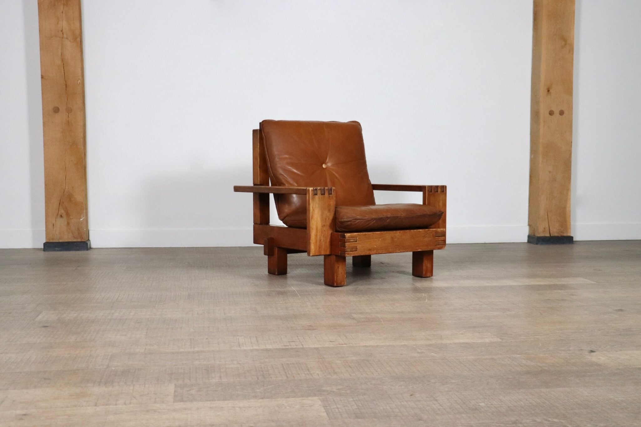 Midcentury_modern_Brutalist_lounge_chair_in_oak_and_leather,_Italy_1970s