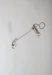 Minimalist_wall_lamp_'194'_by_Tito_Agnoli_for_Oluce,_1950s
