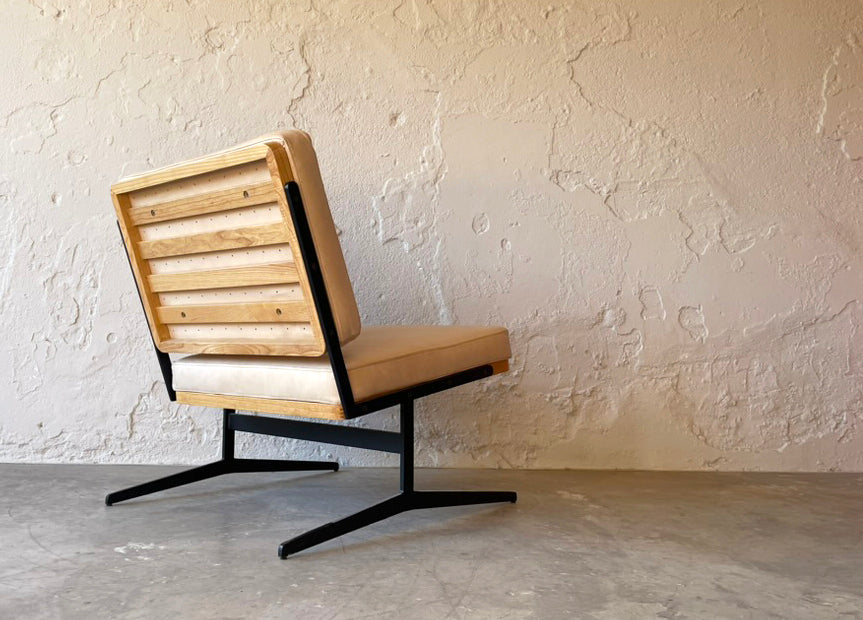 Modernist_Easy_Chair_in_Faux_Leather_and_Cast_Iron,_1990s