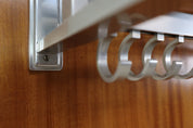 Modernist_wall-mounted_cloakroom_in_Teak,_Aluminium_&_Nickel-plated_Brass,_1950s