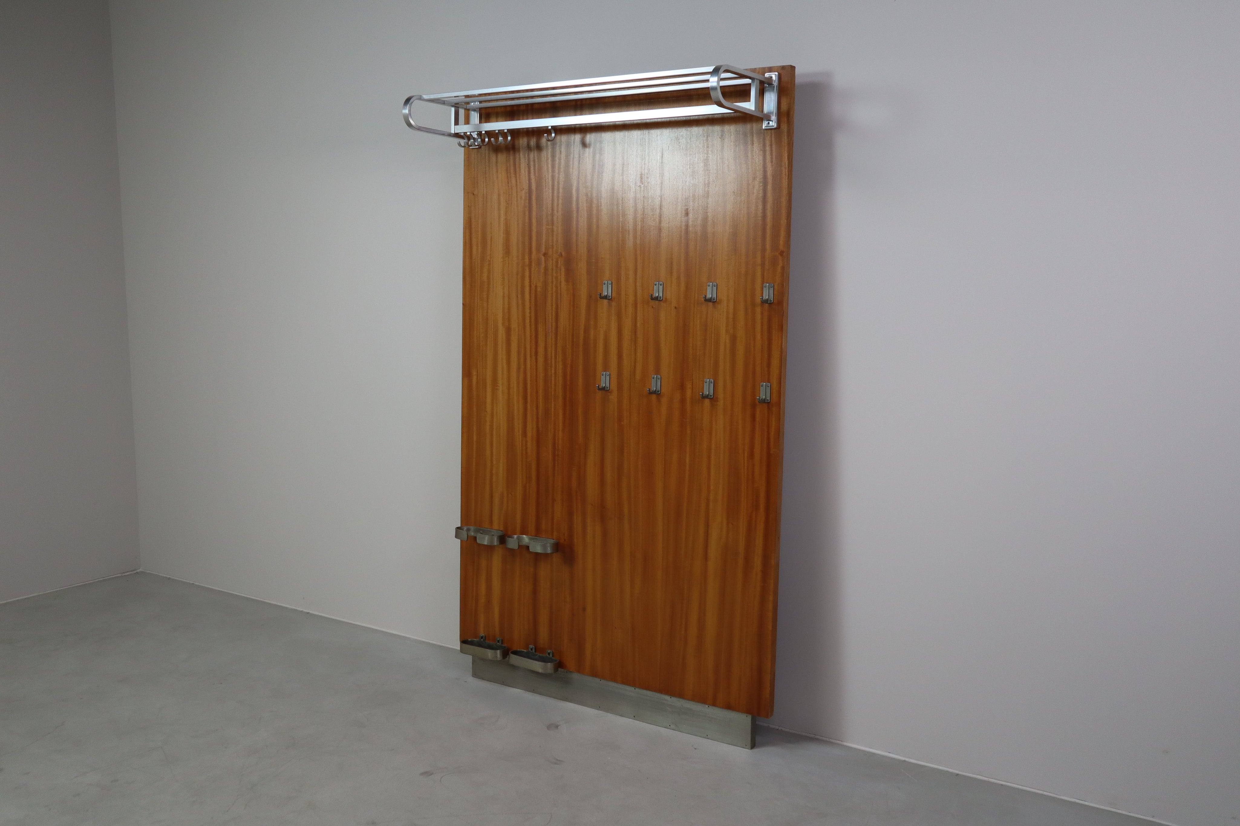 Modernist_wall-mounted_cloakroom_in_Teak,_Aluminium_&_Nickel-plated_Brass,_1950s