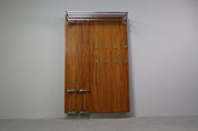 Modernist_wall-mounted_cloakroom_in_Teak,_Aluminium_&_Nickel-plated_Brass,_1950s