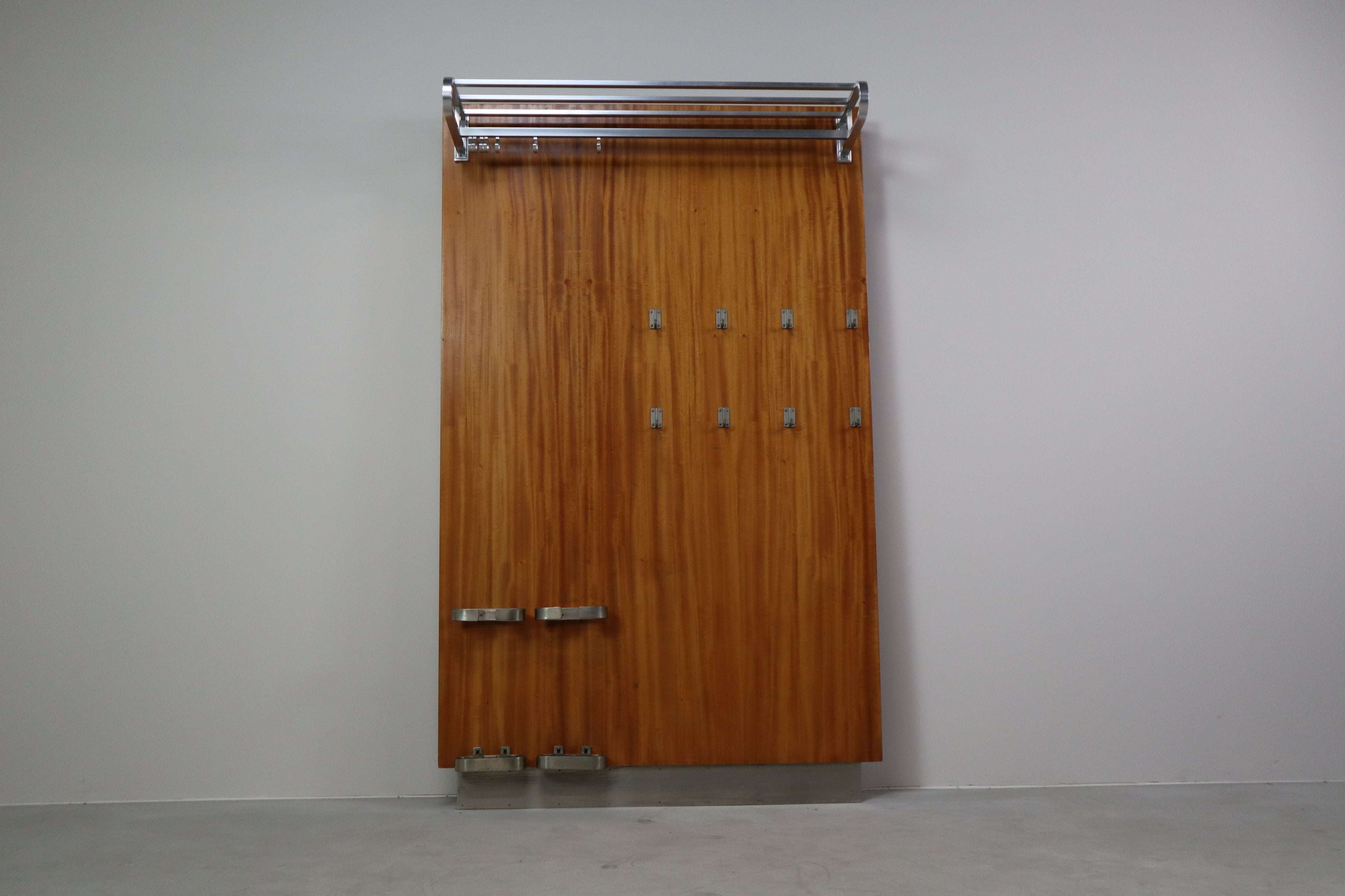 Modernist_wall-mounted_cloakroom_in_Teak,_Aluminium_&_Nickel-plated_Brass,_1950s