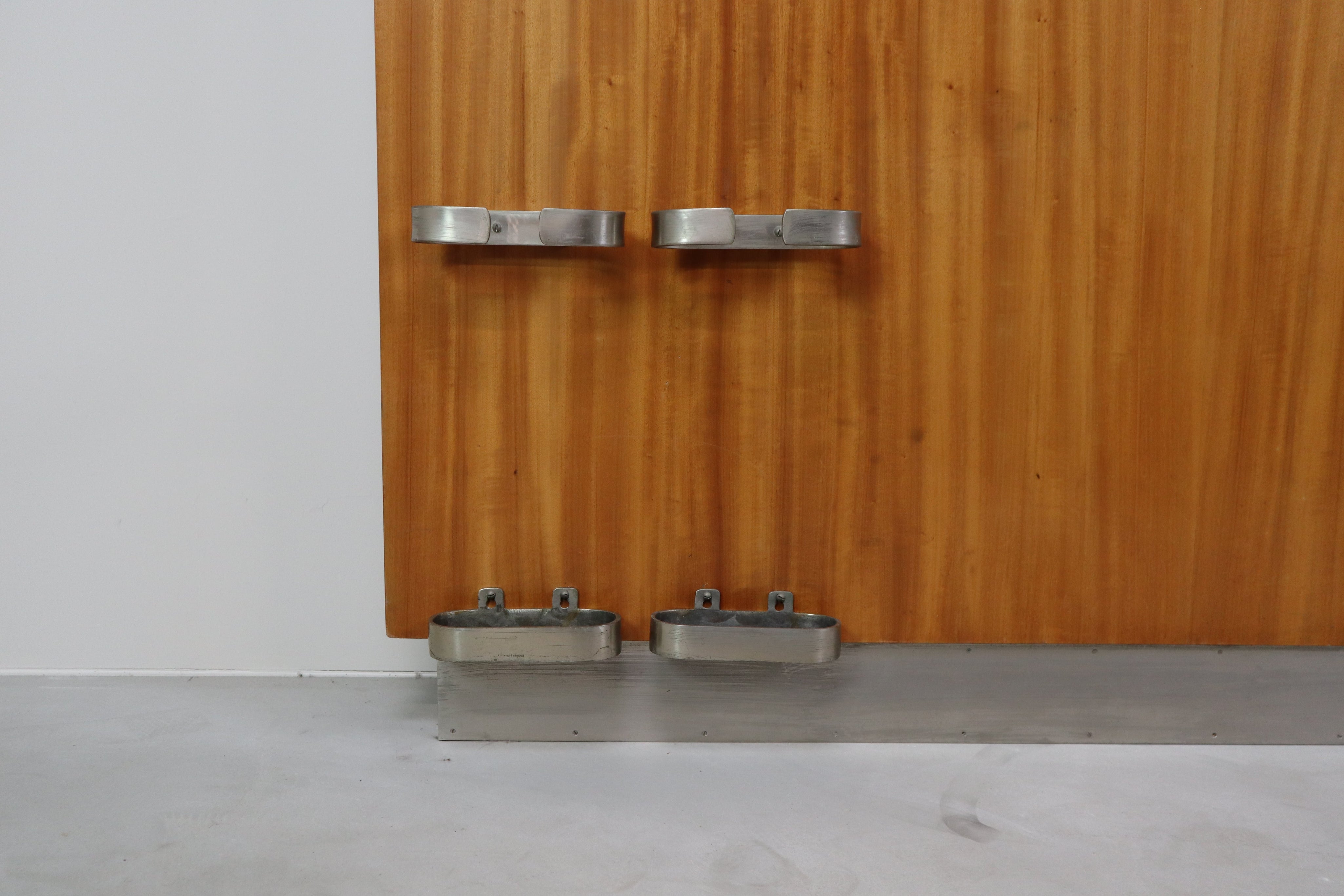Modernist_wall-mounted_cloakroom_in_Teak,_Aluminium_&_Nickel-plated_Brass,_1950s