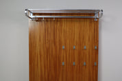 Modernist_wall-mounted_cloakroom_in_Teak,_Aluminium_&_Nickel-plated_Brass,_1950s