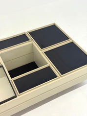 Modular_white_coffee_table_designed_by_Carlo_Hauner_for_Forma