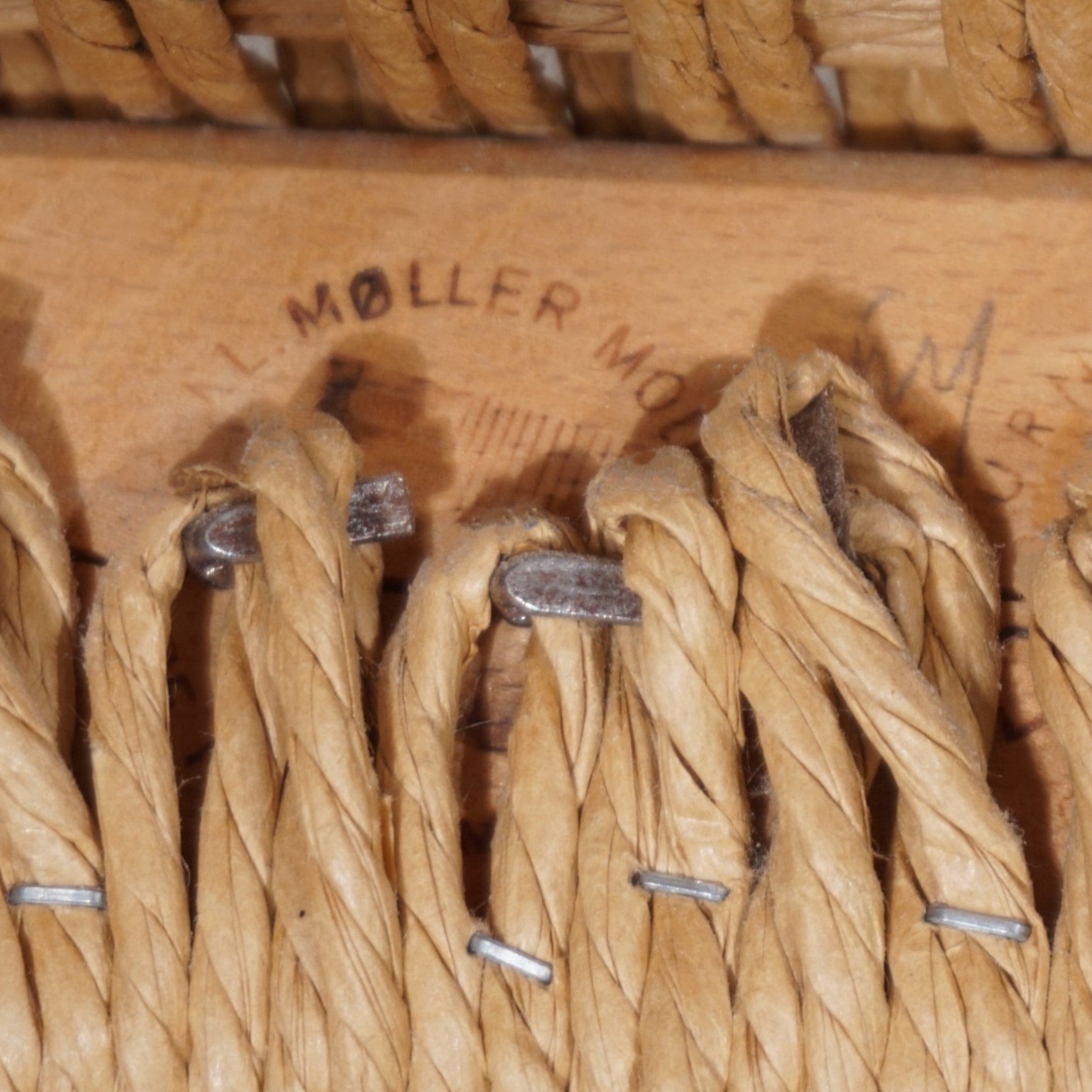 Niels_Otto_Møller_Model_56_Armchair_in_Teak_and_Papercord_for_J.L._Møllers_Møbelfabrik