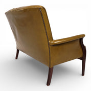 Moss_green_Froxfield_leather_two-seater_sofa_by_Parker_Knoll,_1960
