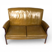 Moss_green_Froxfield_leather_two-seater_sofa_by_Parker_Knoll,_1960