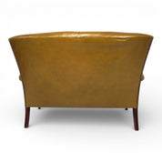 Moss_green_Froxfield_leather_two-seater_sofa_by_Parker_Knoll,_1960