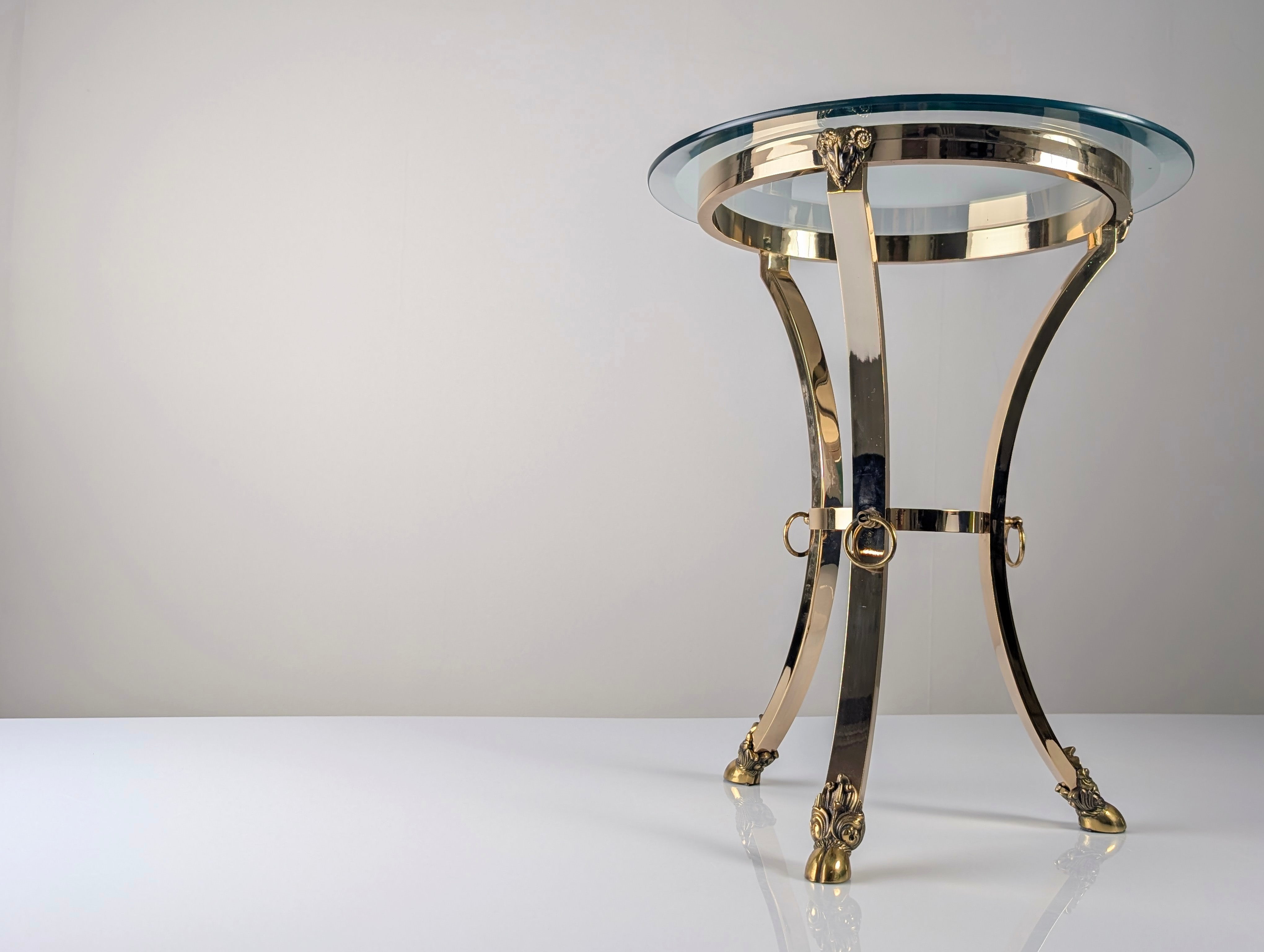 1970s_Neoclassical_Brass_and_Bevelled_Glass_Side_Table_with_Ram_Heads,_Maison_Jansen_Style