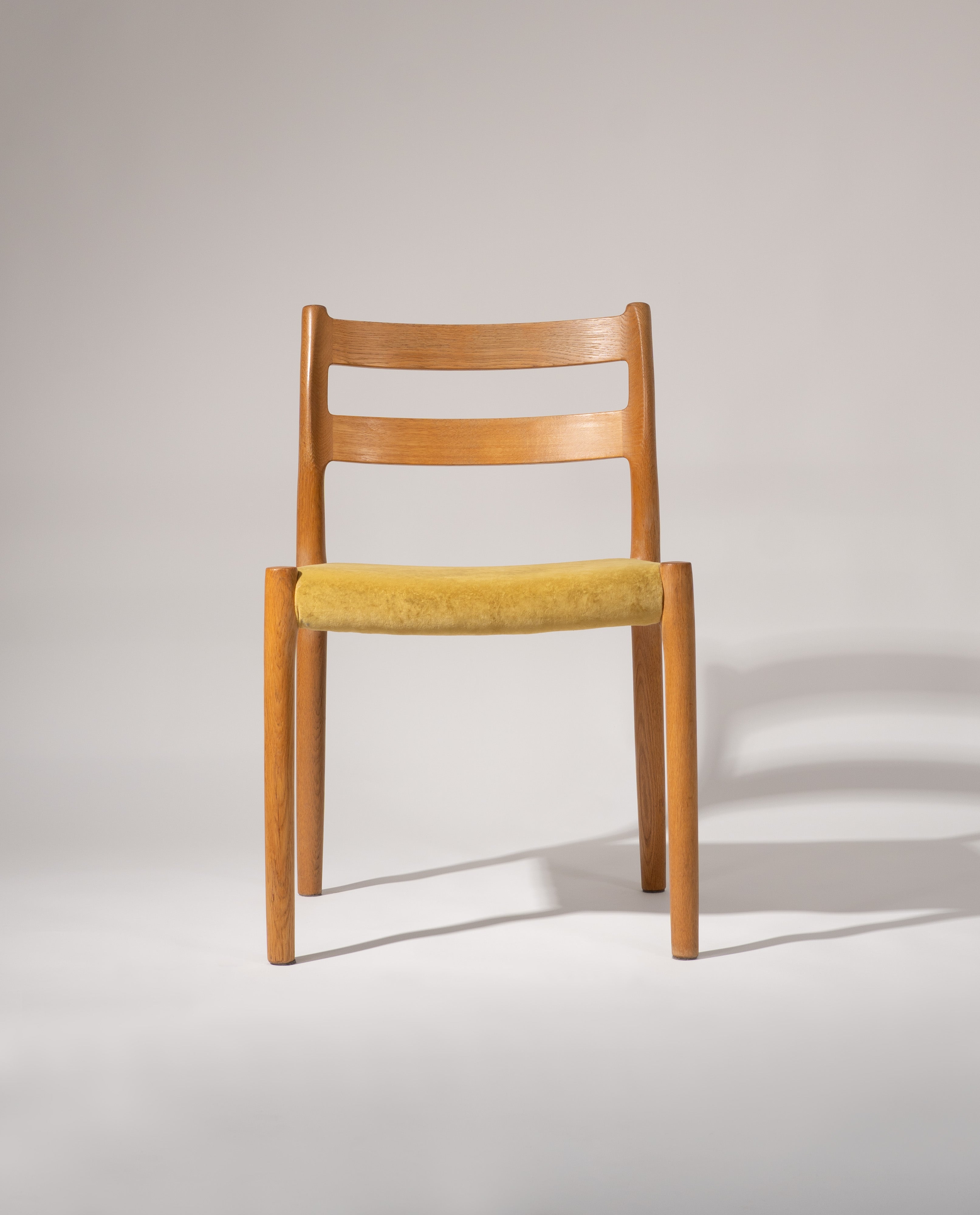 Set_of_2_Model_84_Chairs_by_Niels_Otto_Møller,_1976