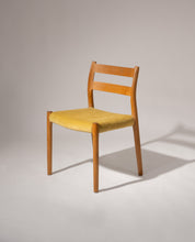 Set_of_2_Model_84_Chairs_by_Niels_Otto_Møller,_1976