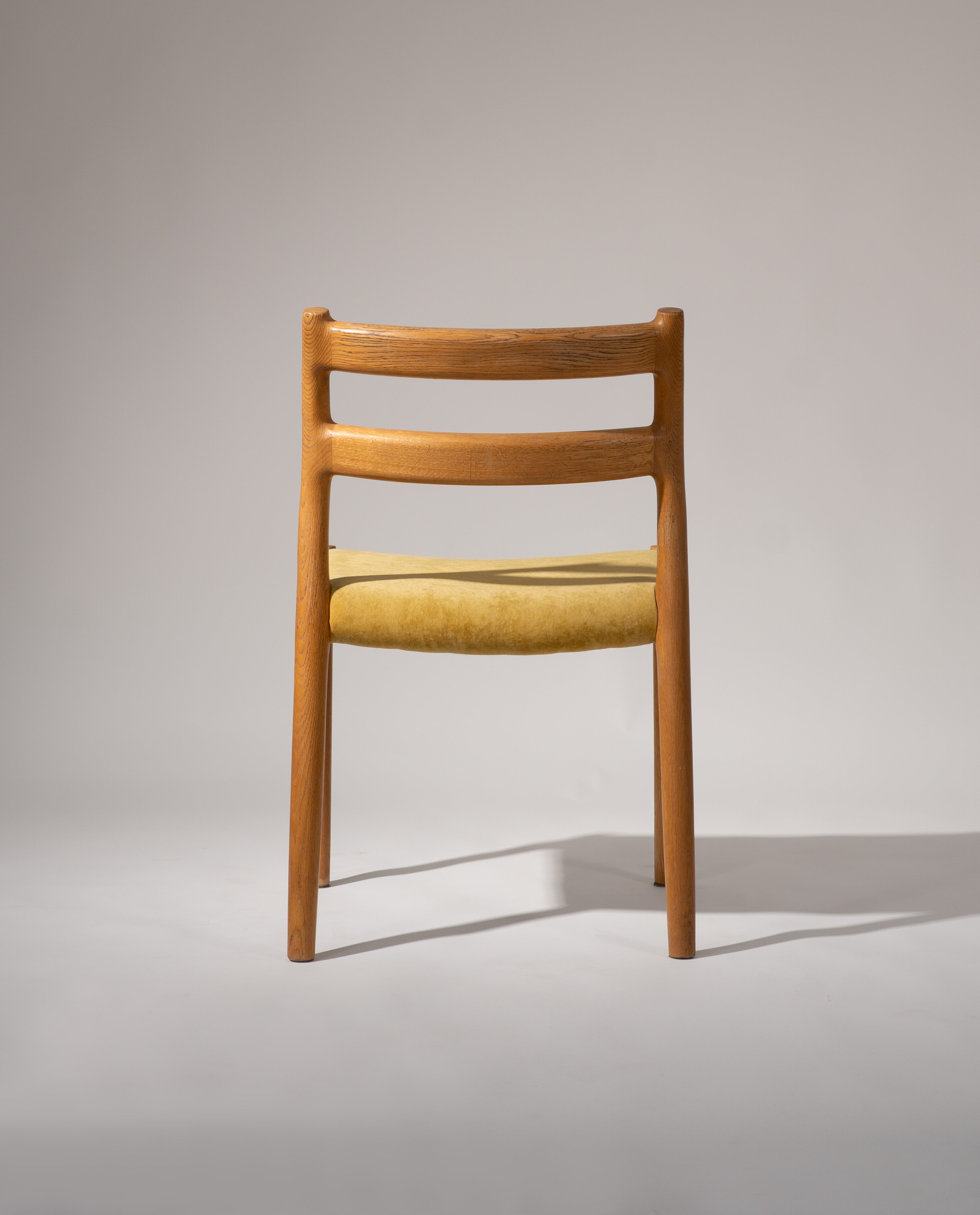 Set_of_2_Model_84_Chairs_by_Niels_Otto_Møller,_1976