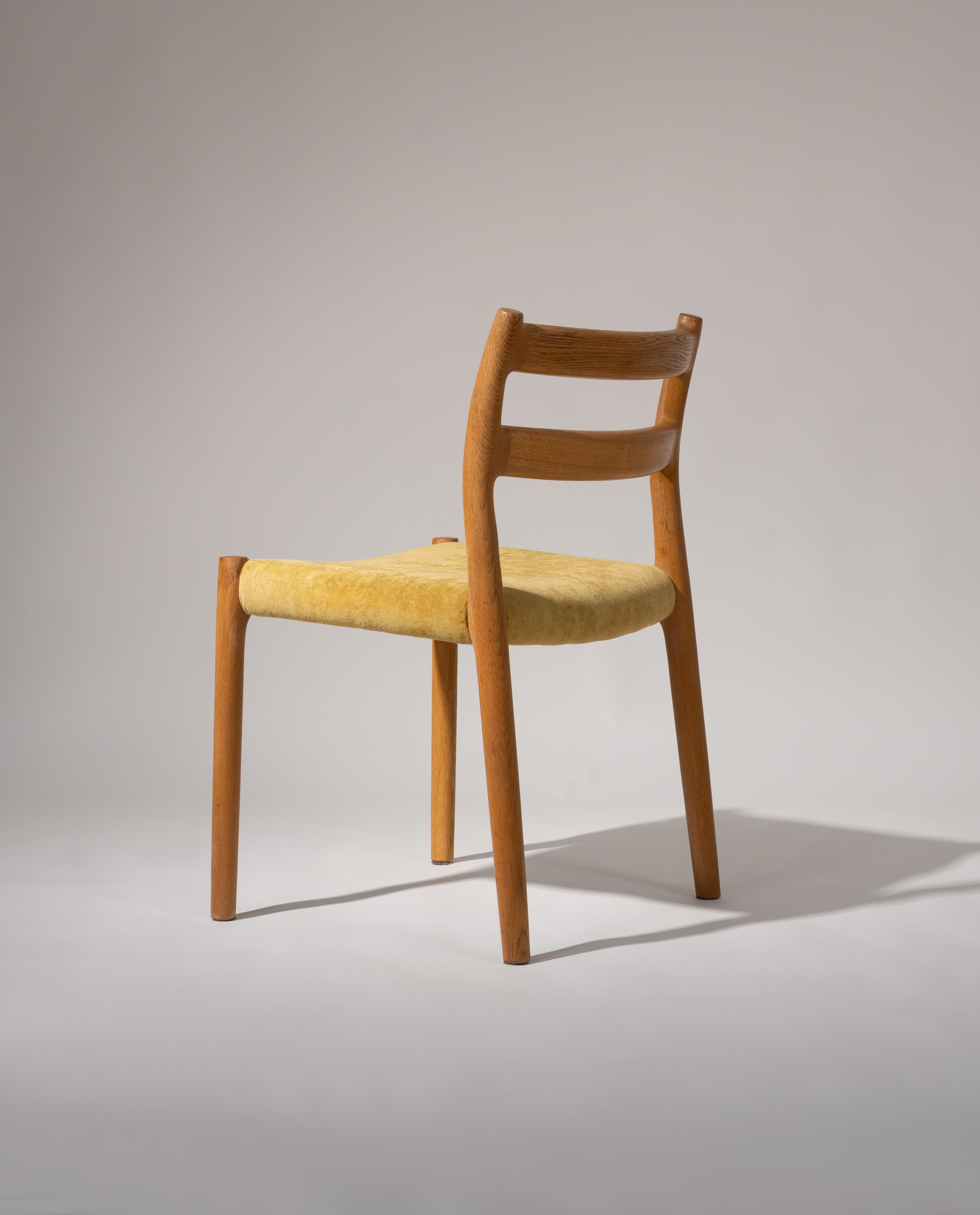 Set_of_2_Model_84_Chairs_by_Niels_Otto_Møller,_1976