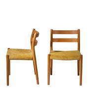 Set_of_2_Model_84_Chairs_by_Niels_Otto_Møller,_1976