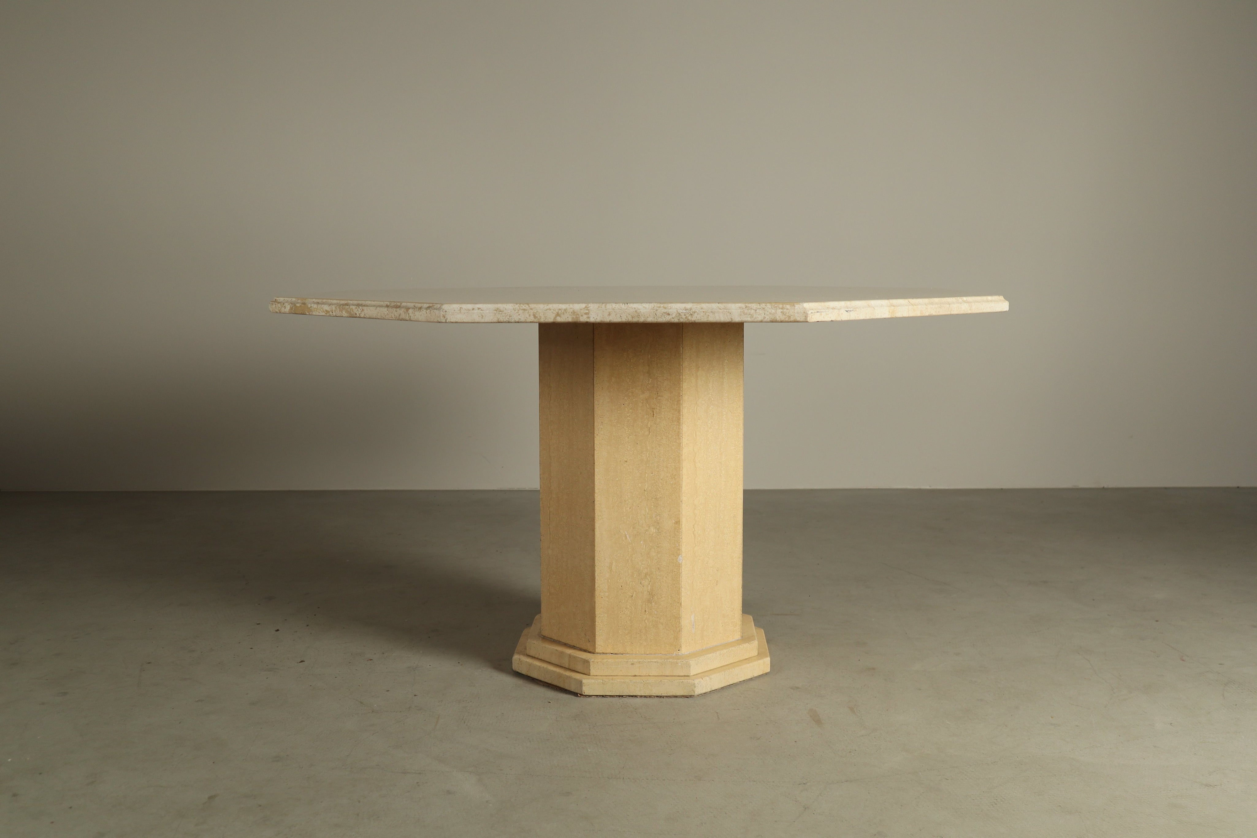 Octagonal_travertine_dining_table,_1970s