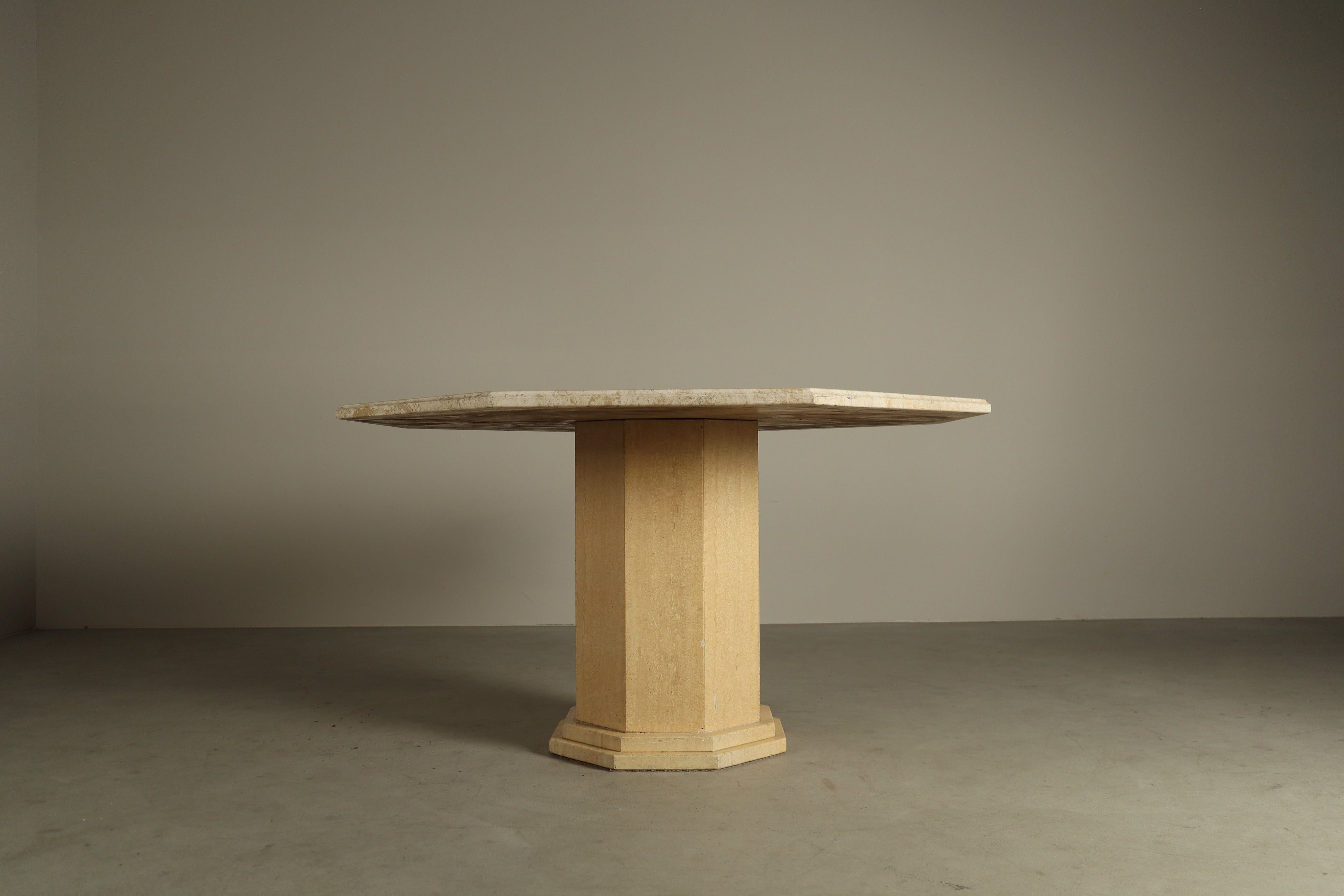Octagonal_travertine_dining_table,_1970s