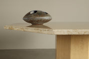 Octagonal_travertine_dining_table,_1970s