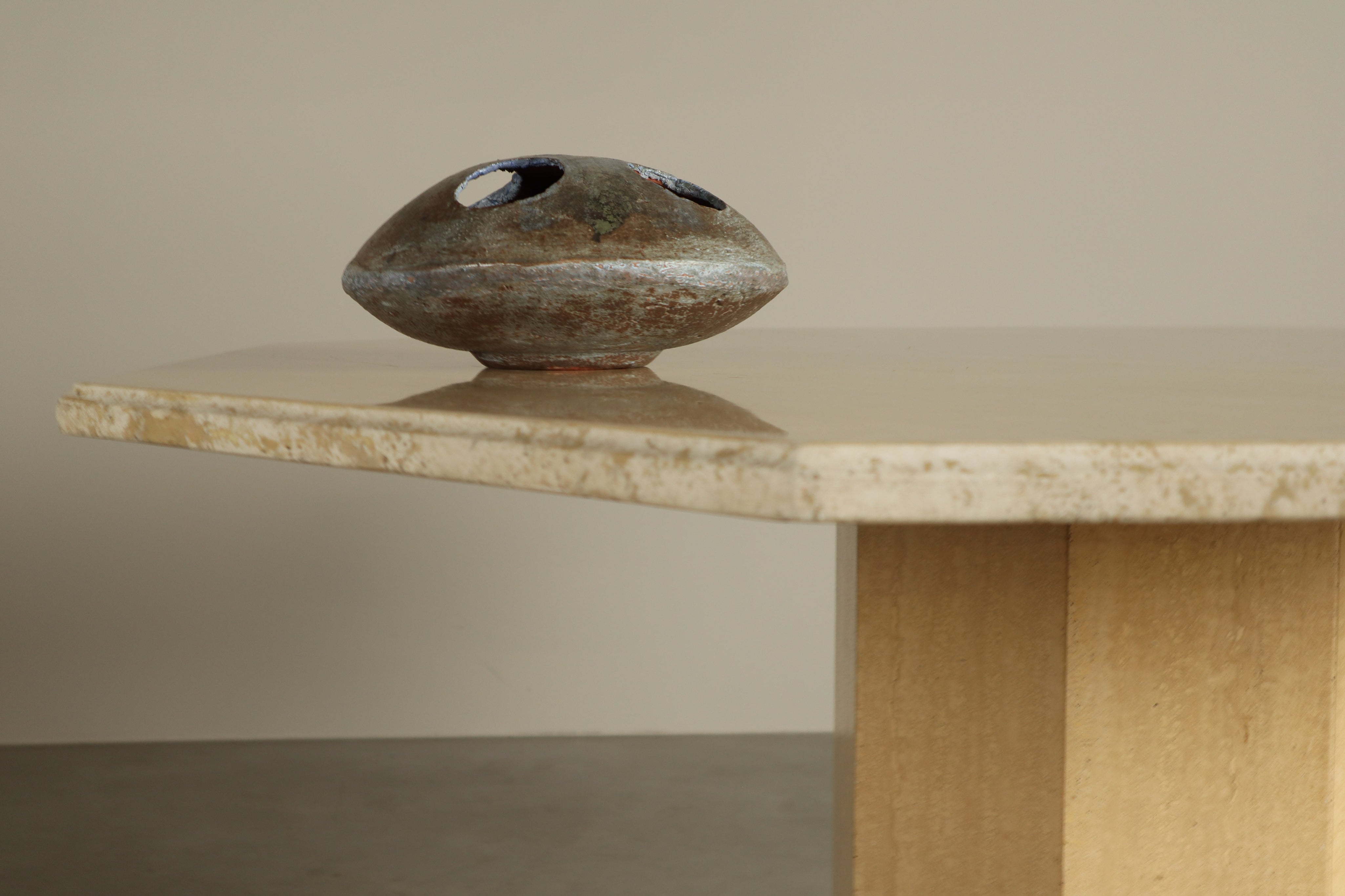 Octagonal_travertine_dining_table,_1970s