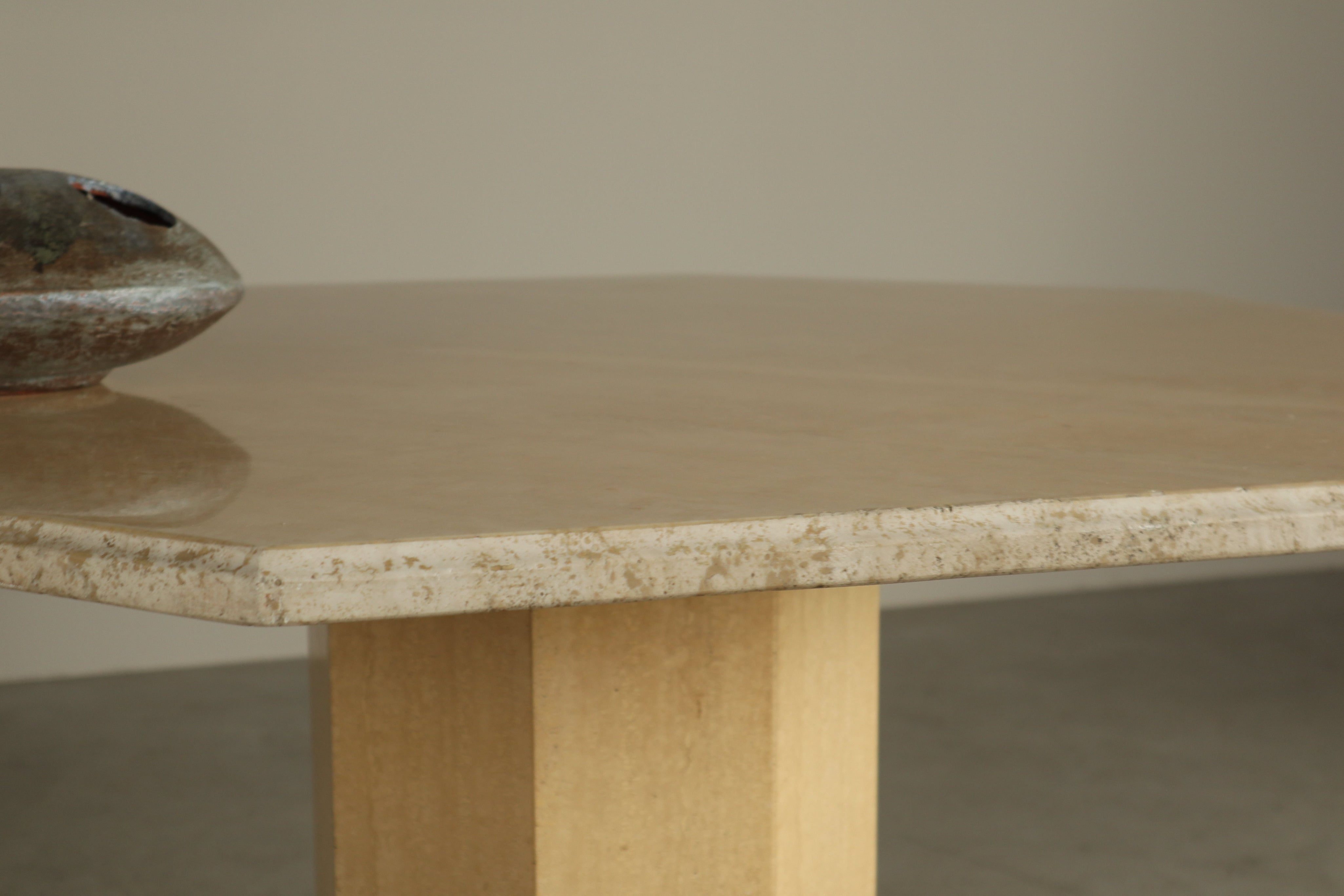 Octagonal_travertine_dining_table,_1970s