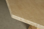Octagonal_travertine_dining_table,_1970s