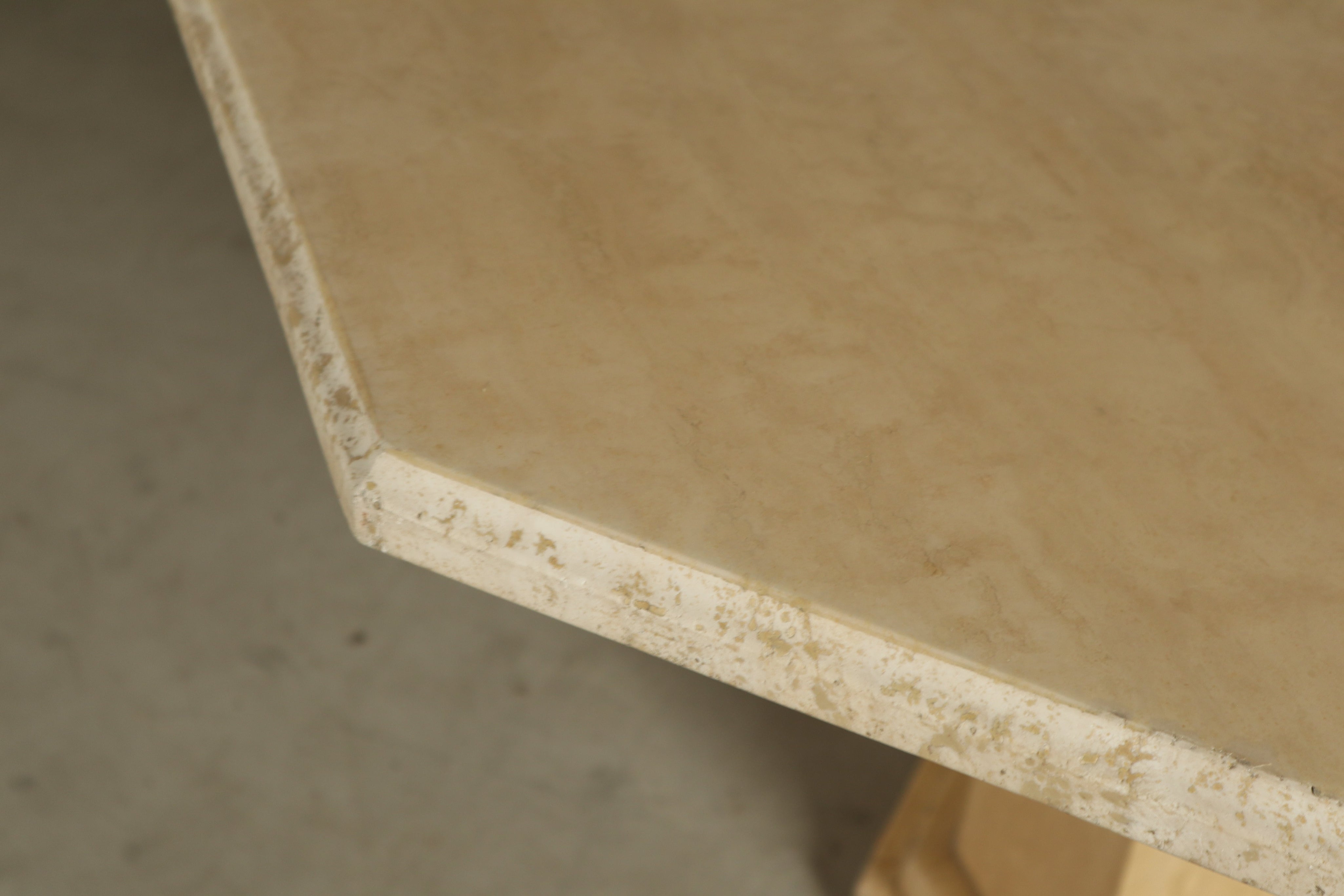 Octagonal_travertine_dining_table,_1970s