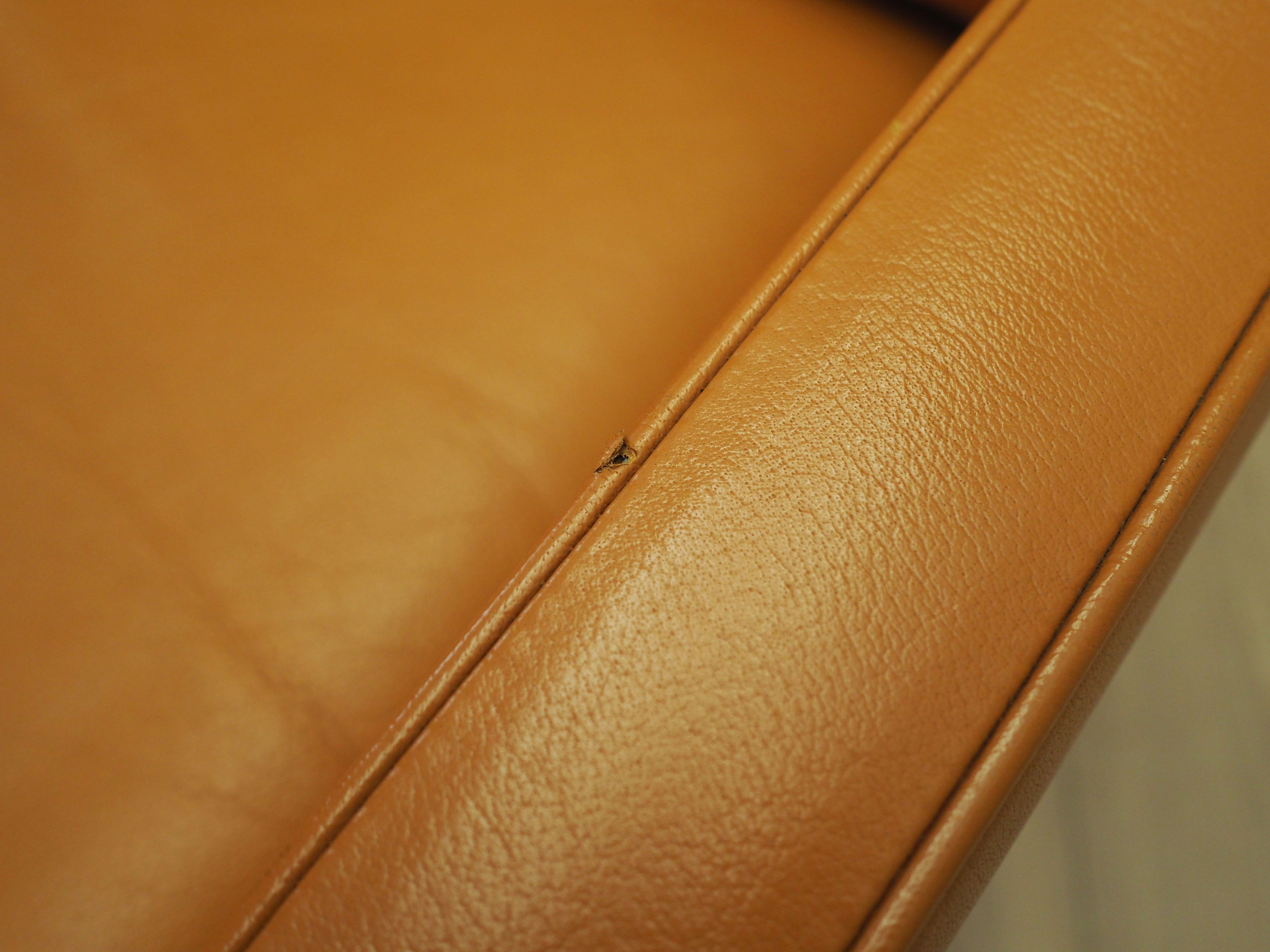 Danish_Modern_Orange_Leather_Armchair,_1970s,_Denmark