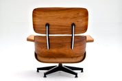 Eames_Lounge_Chair_and_Ottoman_by_Charles_&_Ray_Eames_for_Herman_Miller,_Rosewood_&_Butterscotch_Leather,_1960s