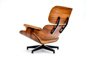 Eames_Lounge_Chair_and_Ottoman_by_Charles_&_Ray_Eames_for_Herman_Miller,_Rosewood_&_Butterscotch_Leather,_1960s