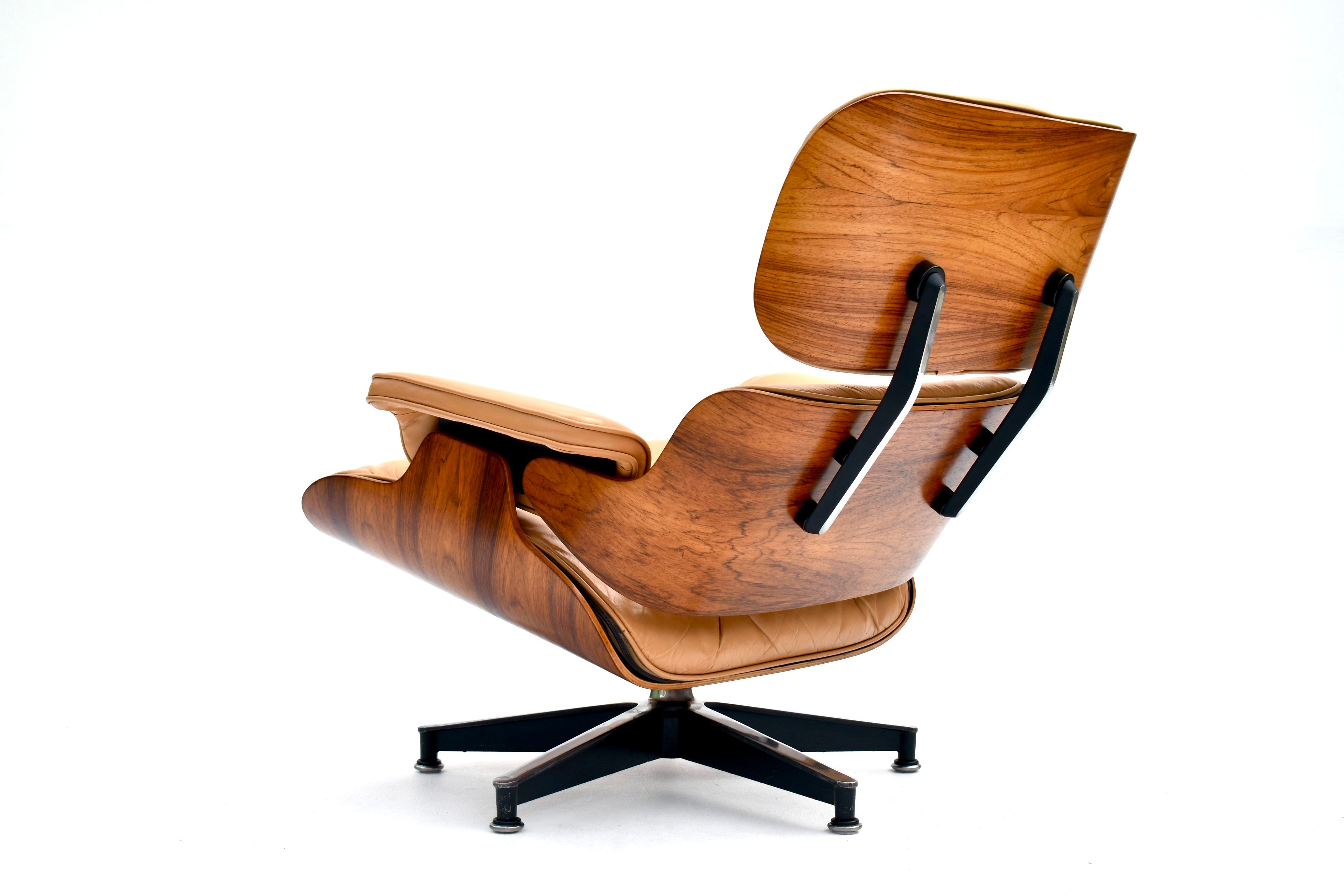Eames_Lounge_Chair_and_Ottoman_by_Charles_&_Ray_Eames_for_Herman_Miller,_Rosewood_&_Butterscotch_Leather,_1960s